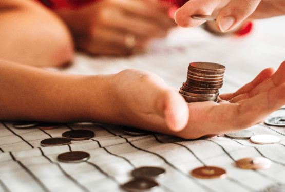 Hand counting pennies