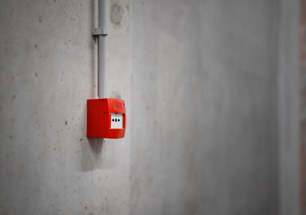 Fire alarm - a visual metaphor for a crisis communications plan that's ready and waiting in case of an emergency.