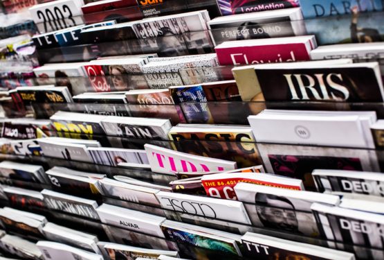 Magazines in news stand