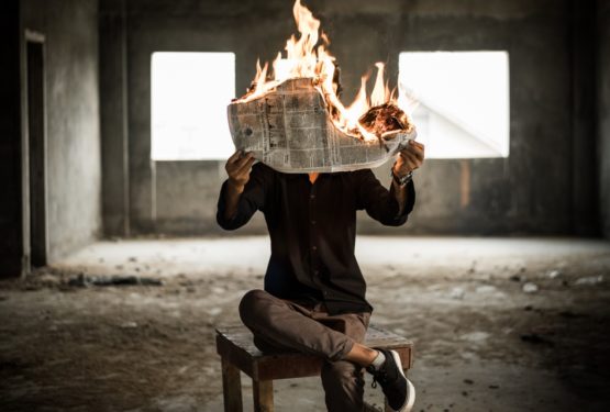 Newspaper on fire