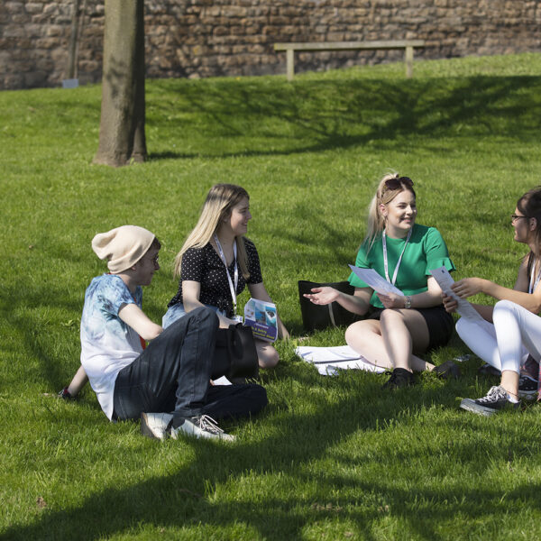 Students sat in the garden at Lincoln College