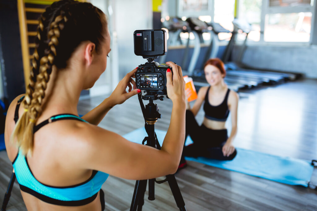 Taking photos of someone doing yoga