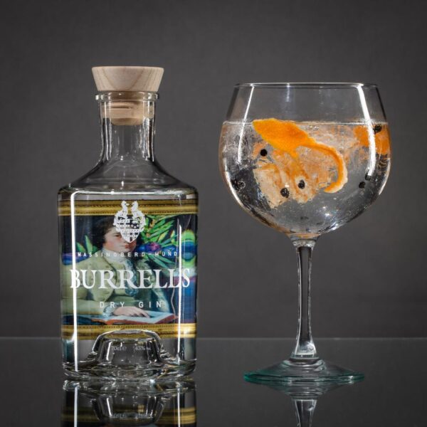 Bottle of Burrells gin from Massingberd Mundy with glass of gin and tonic